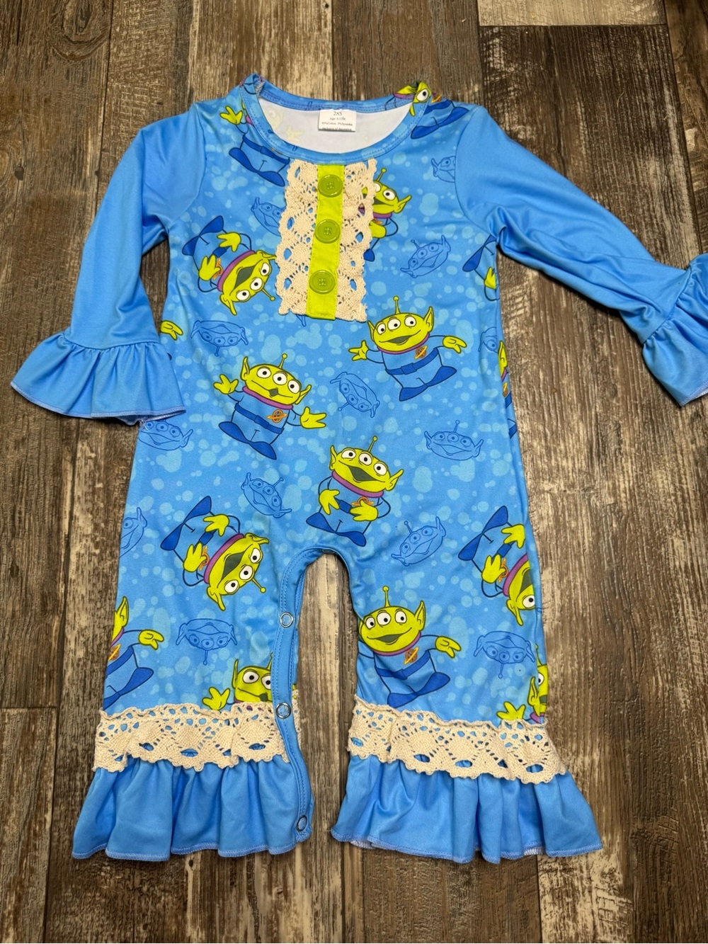 Disney Blue Alien Ruffle Romper with Green Accents